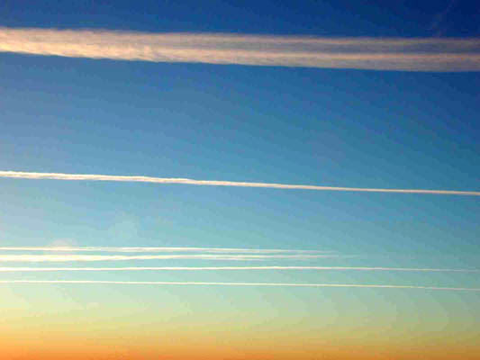 contrails in the sunset