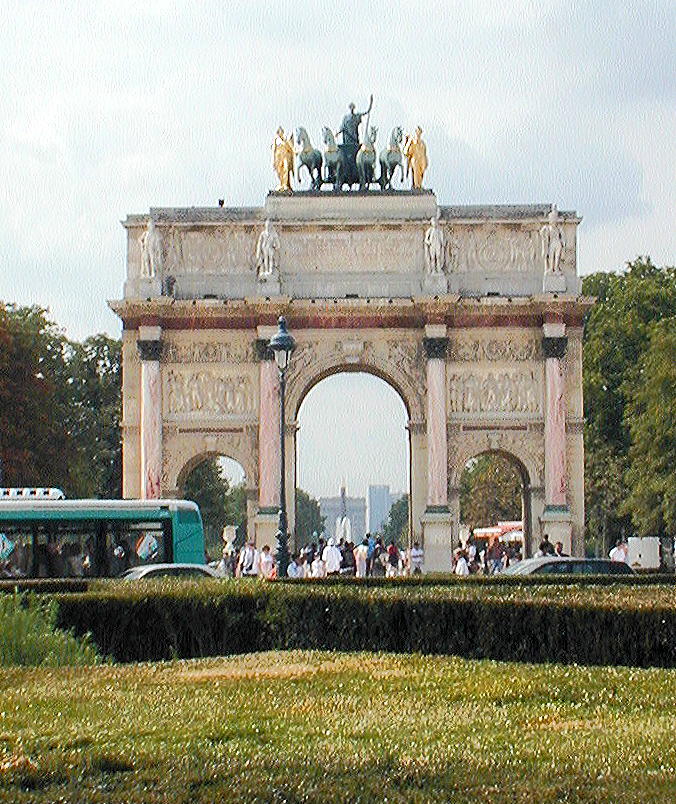 The Place de la Concorde obelisk seen through the Arc Du Carrousel at the Louvre