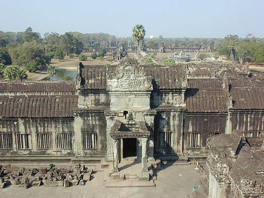 looking down into a courtyard and the gate beyond