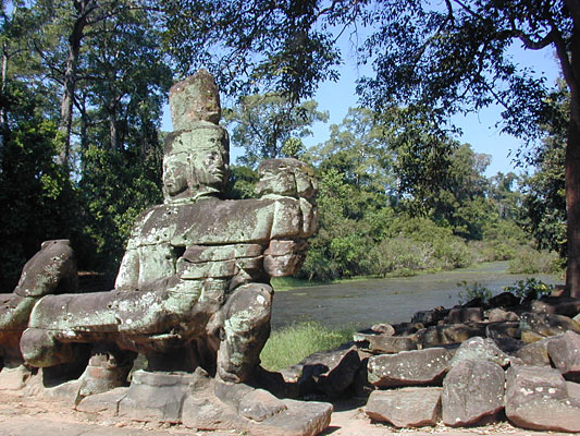 stone figures guard a causeway