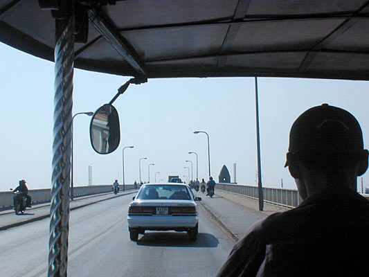 over the bridge into the city